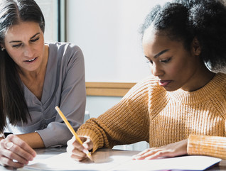 Student and teacher working one-on-one