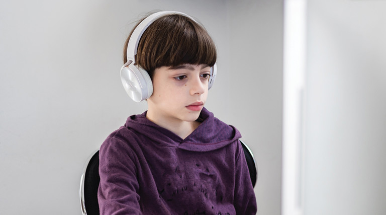 Student remote learning with headset and computer