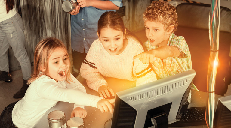 Students excited about innovation and collaboration on computer