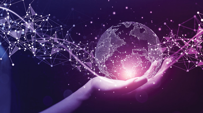 hand holding digital depiction of planet earth hologram