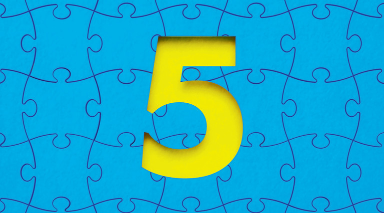 yellow numeral 5 in the negative space of blue puzzle pieces