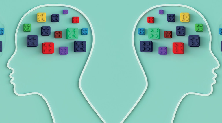Illustration of head silhouettes with toy bricks in their minds and outside of them